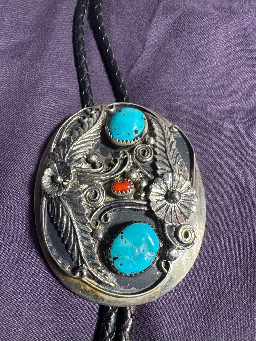Turquoise Stone Western Bolo Tie - Silver Like Floral Accent